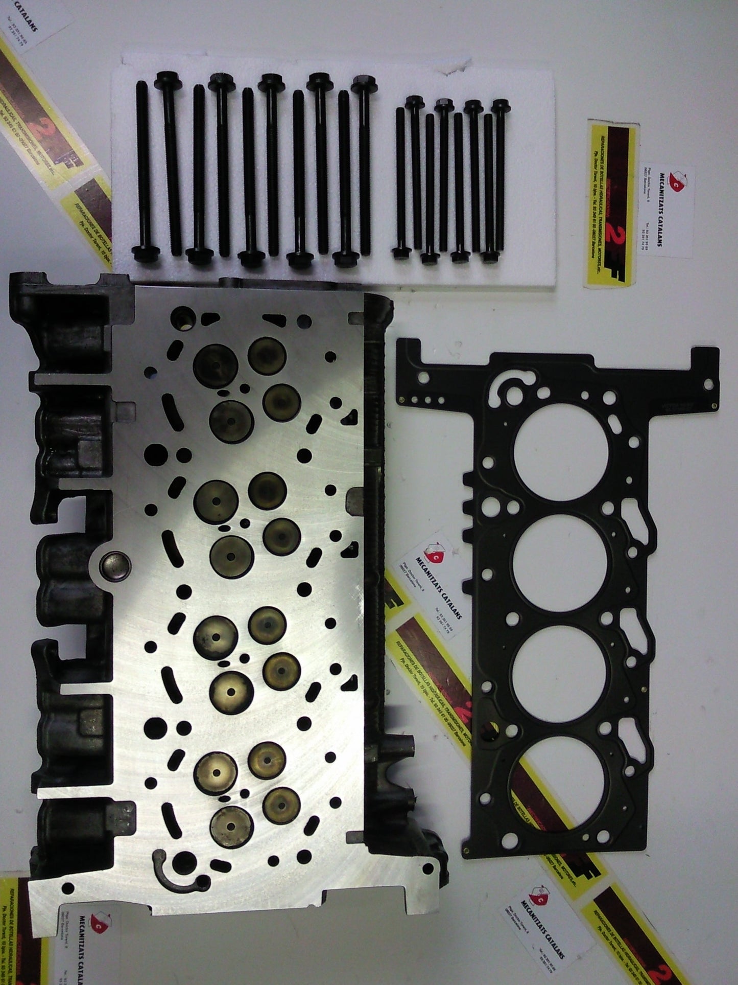 CULATA FORD 2.4 cc - LAND ROVER ( valvulas y muelles )
